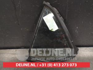 Suzuki Ignis Driehoeks Ruit rechts-achter O411424 foto 2