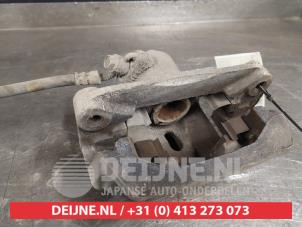 Subaru XV Rear brake calliper, right O411528 photo 2