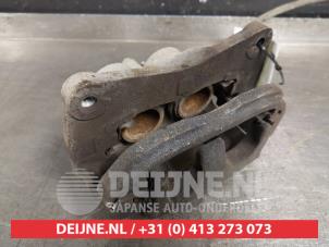 Subaru XV Bremszange links vorne O411527 foto 2