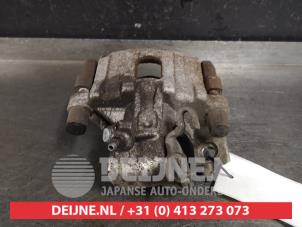 Toyota Yaris Bremszange rechts hinten O412704 foto 3
