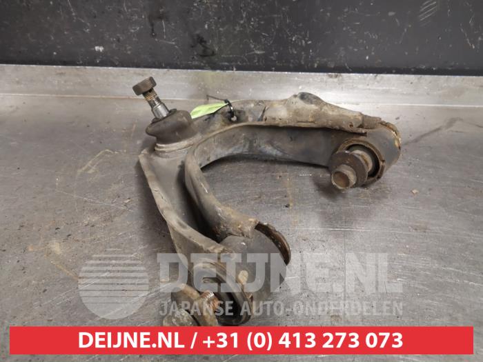 Nissan NP 300 Draagarm boven rechts-voor O413219