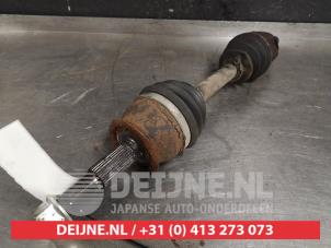 Nissan Navara Aandrijfas rechts-voor O414019 foto 2