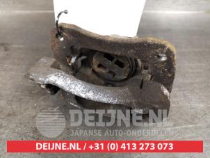 Suzuki Ignis Remklauw (Tang) links-voor O414074 foto 2