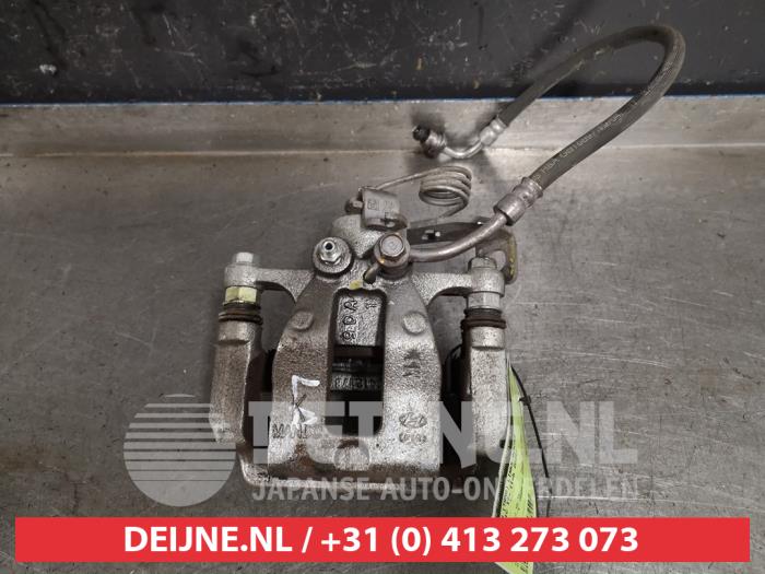 Kia Stonic Remklauw (Tang) links-achter O414145