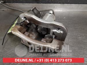 Kia Stonic Remklauw (Tang) links-achter O414145 foto 2