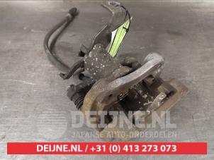 Hyundai Ioniq Bremszange links hinten O414309 foto 2