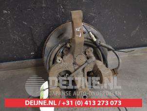 Suzuki Liana Fusee links-achter O414400 foto 2