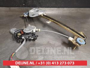 Toyota Celica Window mechanism 2-door, front left O414520 photo 2