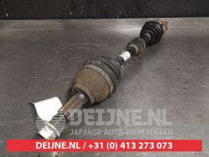 Nissan Pulsar Aandrijfas links-voor O415968 foto 2