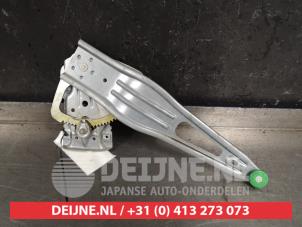Toyota Yaris Fenstermechanik 4-türig links hinten O416125 foto 2