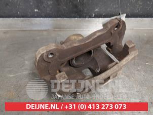 Mitsubishi L200 Bremszange links vorne O416345 foto 2