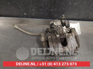Toyota Yaris Bremszange links hinten O417721 foto 3