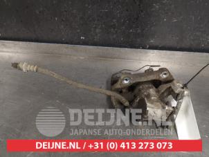 Toyota Yaris Bremszange links hinten O417721 foto 2
