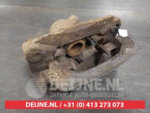 Subaru Forester Bremszange links hinten O418403 foto 2