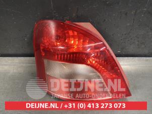 Toyota Yaris Rücklicht links O418893 foto 2