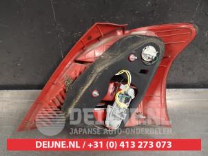 Toyota Yaris Rücklicht links O418893 foto 3