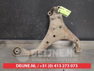 Kia Sportage Querlenker unten links vorne O418943 foto 2