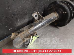 Kia Sportage Schokdemperpoot links-voor O419467 foto 2