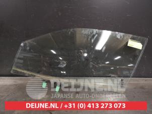 Suzuki Baleno Türscheibe 4-türig links vorne O419887 photo 2