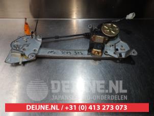 Mazda 323 Ruitmechaniek 4Deurs links-achter O290244 foto 2