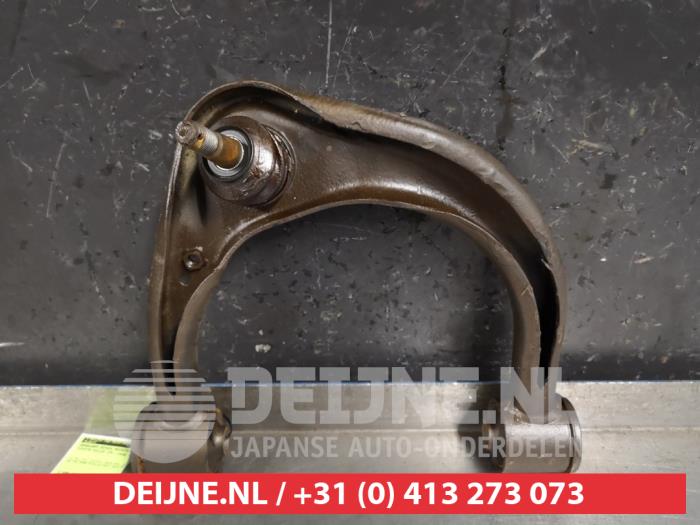 Toyota Hilux Draagarm boven rechts-voor O420861