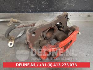 Toyota IQ Bremszange links vorne O421493 foto 2