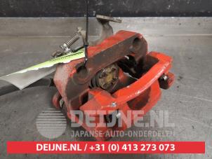 Toyota IQ Bremszange rechts hinten O421496 foto 2
