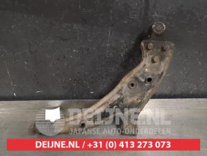 Toyota Starlet Front lower wishbone, right O421531 photo 2