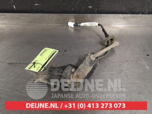 Mitsubishi ASX Xenon hoogteregelaar O424095 foto 2