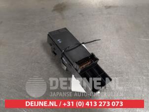Nissan Micra Multi-functional window switch O424224 photo 2