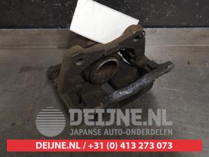 Nissan Micra Bremszange rechts vorne O424247 foto 2