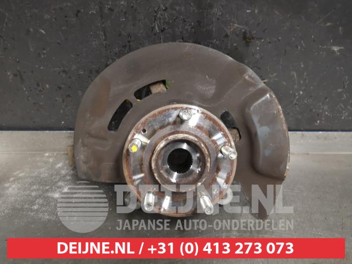 Hyundai Tucson Fusee links-voor O425533