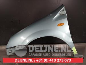 Nissan Almera Tino Front wing, left O426149 photo 2