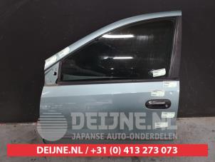 Nissan Almera Tino Tür 4-türig links vorne O426151 foto 2