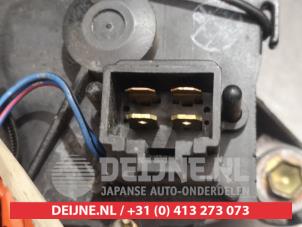 Daihatsu Cuore Ruitenwissermotor voor O349179 foto 3