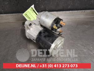 Suzuki Swift Startmotor O427712 foto 2