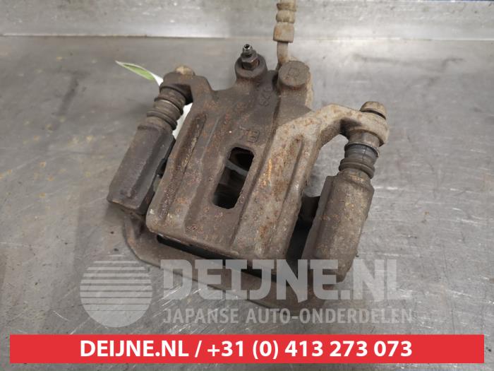 Nissan Pathfinder Remklauw (Tang) rechts-achter O429535