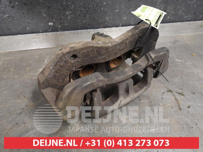 Mitsubishi Pajero Remklauw (Tang) links-voor O429648