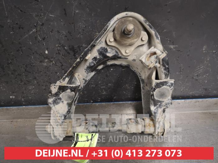 Mazda B-Serie Front upper wishbone, right O430710