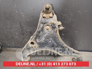 Mitsubishi L200 Front lower wishbone, right O431399 photo 2