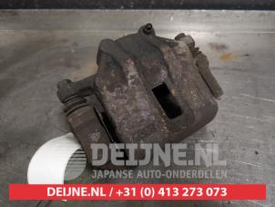Kia Rio Front brake calliper, left O431962 photo 2