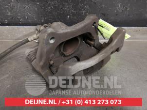 Nissan Micra Bremszange links vorne O432919 foto 2