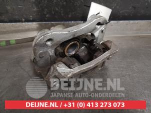 Hyundai Tucson Bremszange links hinten O433126 foto 2