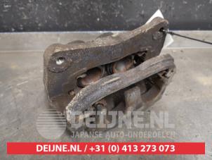 Subaru Legacy Bremszange links vorne O433631 foto 2