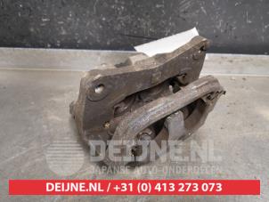 Subaru Legacy Bremszange rechts vorne O433632 foto 2