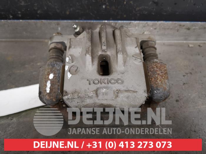 Subaru Legacy Remklauw (Tang) links-achter O433633