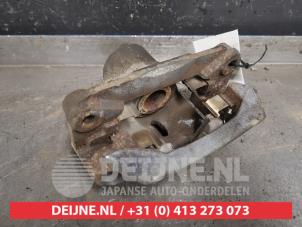 Subaru Legacy Bremszange rechts hinten O433634 foto 2