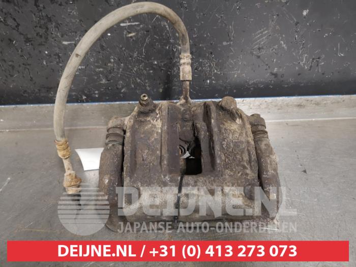 Nissan Terrano Remklauw (Tang) links-voor O434373