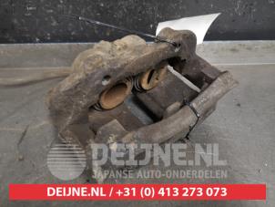 Nissan Terrano Bremszange links vorne O434373 foto 2