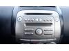 Radio van een Subaru Justy (M3), 2007 / 2011 1.0 12V DVVT, Hatchback, 4Dr, Benzine, 998cc, 51kW (69pk), FWD, 1KRFE, 2007-01 / 2011-03, M351 2009